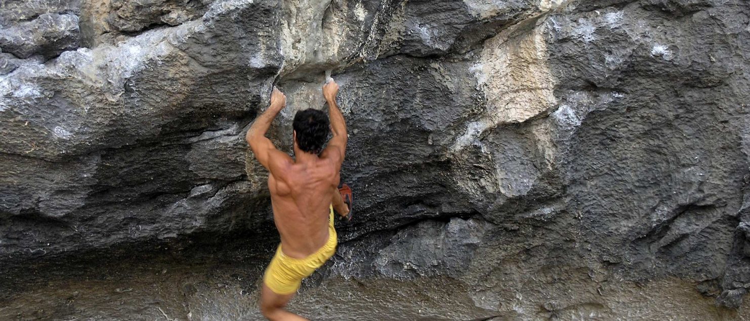 Rock climber making an ascent in Krabi