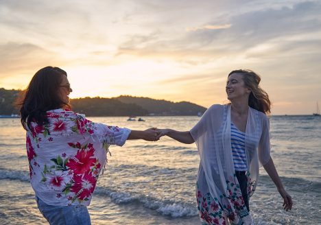 Lesbian couple by the beach