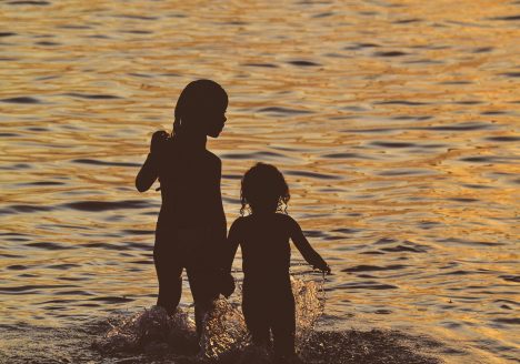 Children in the sea, Thailand
