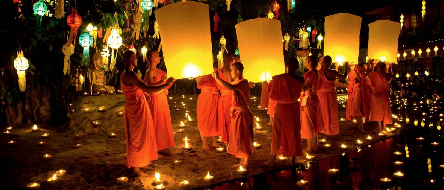 Monks launch lanterns into the air for Loy Krathong festival in Chiang Mai, Thailand