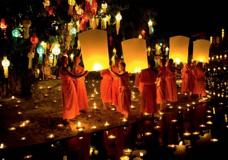 Monks launch lanterns into the air for Loy Krathong festival in Chiang Mai, Thailand