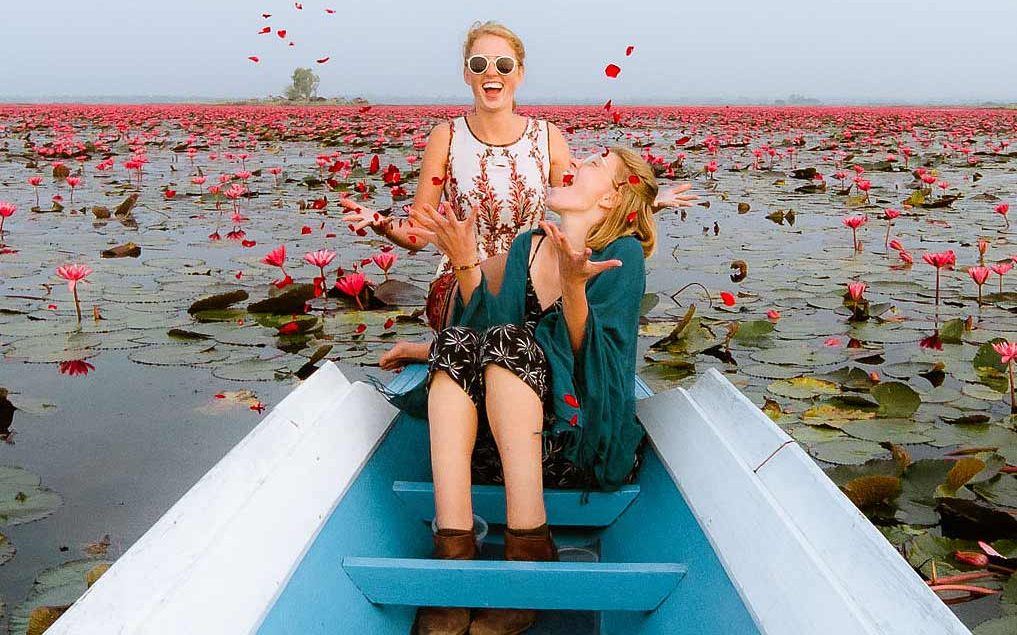 Once Upon A Journey on a boat tour on Udon Thani's Red Lotus Lake, Thailand