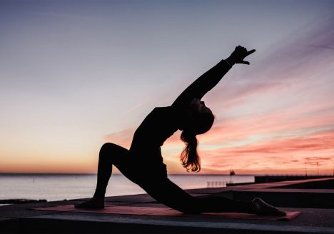 Beachside yoga is one way to relax in Thailand