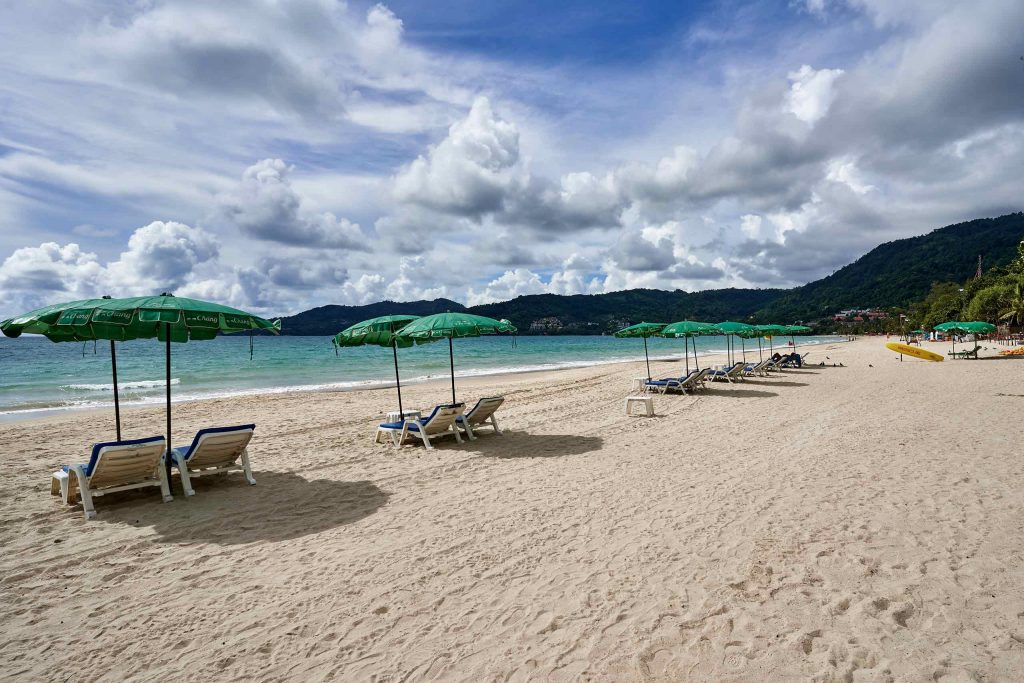 Sun loungers line the shores of Patong Beach, one of Phuket's gayest beaches. 