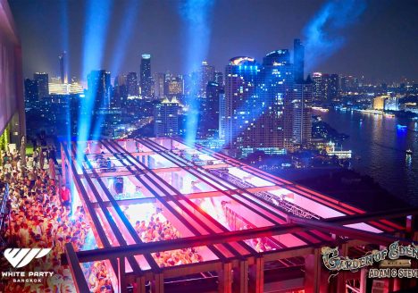 White Party Bangkok illuminating the night sky. Photography courtesy of White Party Bangkok - Cloud 9 Inc.