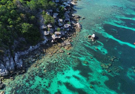 Bird's eye view of a resort against the coast of Koh Tao.