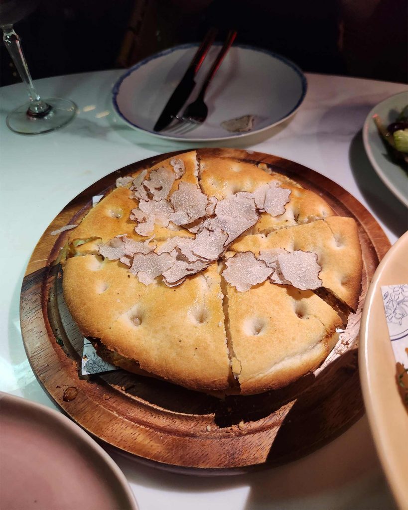 A Mediterranean bread with truffle shavings.