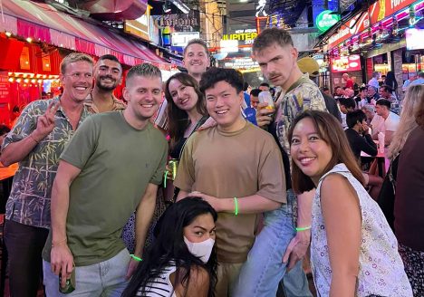 A group of travellers on a tour of Silom.