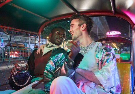Two travellers in a tuk-tuk in Bangkok.