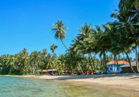 A beach with huts in Koh Mak, Thailand.