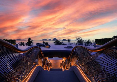 Sunset views from the grounds of a luxury hotel staircase.