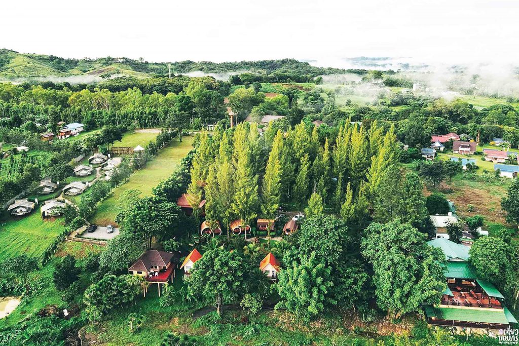 A resort hidden amongst trees in the Thai countryside.