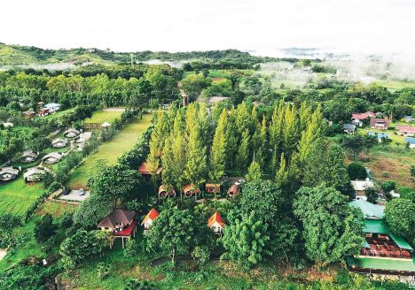 A resort hidden amongst trees in the Thai countryside.